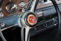 Checker Motors Corporation car interior - steering wheel with logo and dashboard