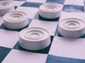 Checkerboard with checkers. Business strategy competition, strategic planning for winning success. Hobby. Royalty Free Stock Photo