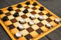 Checkerboard with checkers. Business strategy competition, strategic planning for winning success. Hobby. checkers on Royalty Free Stock Photo
