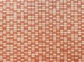 Checkerboard or chessboard pattern in orange-red as background