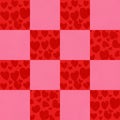 A checkerboard pattern alternates between pink and red squares. The red squares Royalty Free Stock Photo