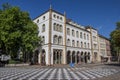 Checkerboard pattern in front of an old building in Osnabruck