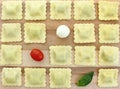 Checkerboard ravioli with tomato, bocconcini and basil Royalty Free Stock Photo