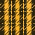 Checkered autumn plaid gingham twill tartan seamless pattern in yellow , mustard and dark brown Royalty Free Stock Photo