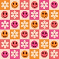 Checkered colorful smiley faces with flowers seamless pattern in orange, pink and coral.