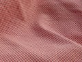 Checkered fabric close up. Red. Royalty Free Stock Photo
