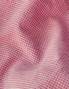 Checkered fabric close up. Red. Pink Royalty Free Stock Photo