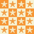 Checkered orange and white starfish seamless pattern.