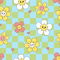 Checkered seamless pattern with cute smiling flowers and hearts. Vector graphics Royalty Free Stock Photo