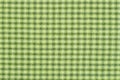 Checkered tablecloth for the table in green and white cells. Background texture of olive textile Royalty Free Stock Photo