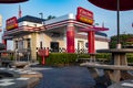 Checkers fast food restaurant exterior front table view