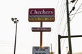 Checkers fast food restaurant exterior street sign