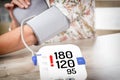 Checking blood pressure at home Royalty Free Stock Photo