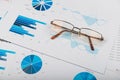 Glasses and pile of documents Royalty Free Stock Photo