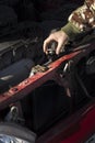 Checking the coolant level in the car. The cap of the radiator, check fluid, replacement fluid. Royalty Free Stock Photo