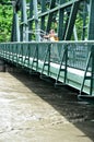 Checking floodwaters on the Winooski River in Montpelier, Vermont