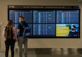 Checking the information board Calgary Airport August 2021