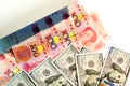 Checking one hundred dollar and yuan banknotes with ultraviolet