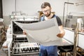 Checking printing quality at the printing plant Royalty Free Stock Photo