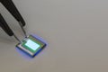 Checking turn on small oled display of blue color with a probe station