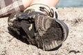 Checking on worn out shoe. Royalty Free Stock Photo