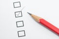 Checklist box and red pencil. Royalty Free Stock Photo