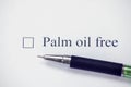 Checklist box with words palm oil free and pen on white paper. Check form concept Royalty Free Stock Photo