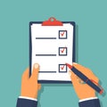 Checklist clipboard. Human holding checklist and pencil Royalty Free Stock Photo