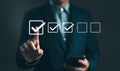 Checklist concept. Businessman tick correct sign mark in checkbox for quality document control checklist. Online test, Checkmark, Royalty Free Stock Photo