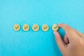 Checklist concept, check mark on wooden blocks, blue background with copy space