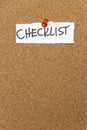 A checklist displayed on a corkboard, showcasing organization and planning. This image can be used in various contexts, Royalty Free Stock Photo
