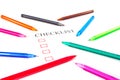 Checklist with pens and checked Royalty Free Stock Photo