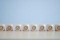 Goals achievement and business success. Green check mark icon on wooden blocks.