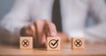 Checkmark and cross icons on wooden cubes on white background. Regulatory compliance, project feasibility concept. Tick and cross Royalty Free Stock Photo