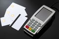 Checkout cashier, financial transaction and electronic payments concept with credit and debit card reader with rubber keyboard