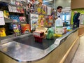 A checkout counter with food on the counter of Publix grocery store