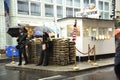 Checkpoint Charlie In Berlin Germany in the pouring rain