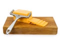 Cheddar Cheese on a Cutting Board Royalty Free Stock Photo