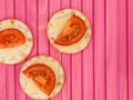 Cheddar Cheese and Tomato Snacks on Water Biscuit Crackers