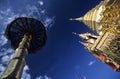 Chedi and parasol in a buddhist temple Royalty Free Stock Photo