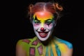 Cheeful woman with a body art clown