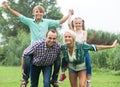 Family of four resting at countryside. Royalty Free Stock Photo