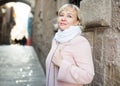 Cheerful adult woman in scarf