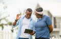 Cheerful african american couple with digital tablet, happiness family concepts Royalty Free Stock Photo