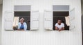 Cheerful african american couple at window, happiness family concepts