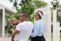 Cheerful african american family in front of their new house, Happiness family concepts Royalty Free Stock Photo