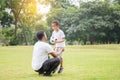 Cheerful african american father and son playing with football in park, Happiness family concepts Royalty Free Stock Photo