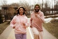 cheerful african american joggers looking at