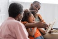 Cheerful african american kid laughing near Royalty Free Stock Photo