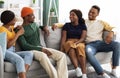 Cheerful african american millennial friends having home party Royalty Free Stock Photo